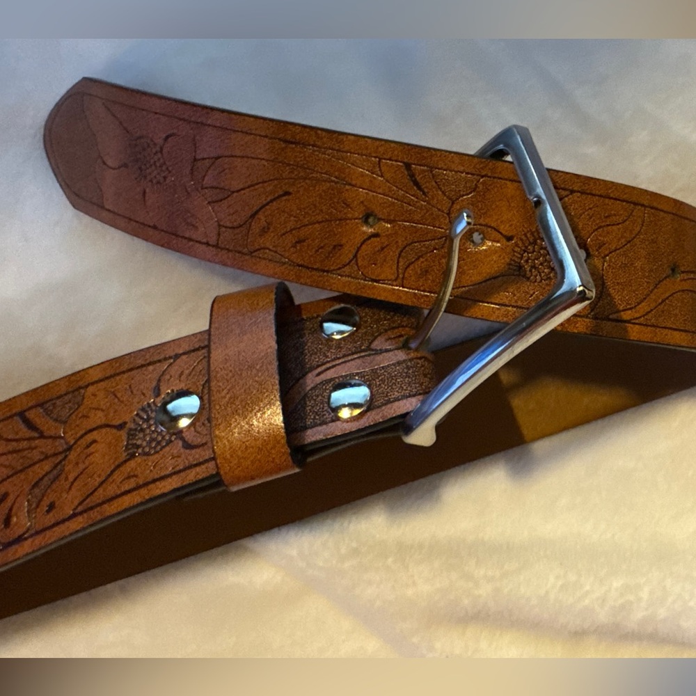 New without tags, ladies brown Western inspired belt, silver hardware